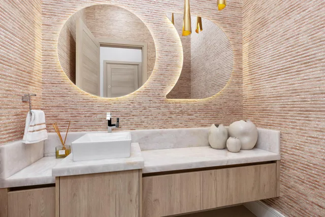 an aerial view of a residential houses with outdoor space and swimming pool