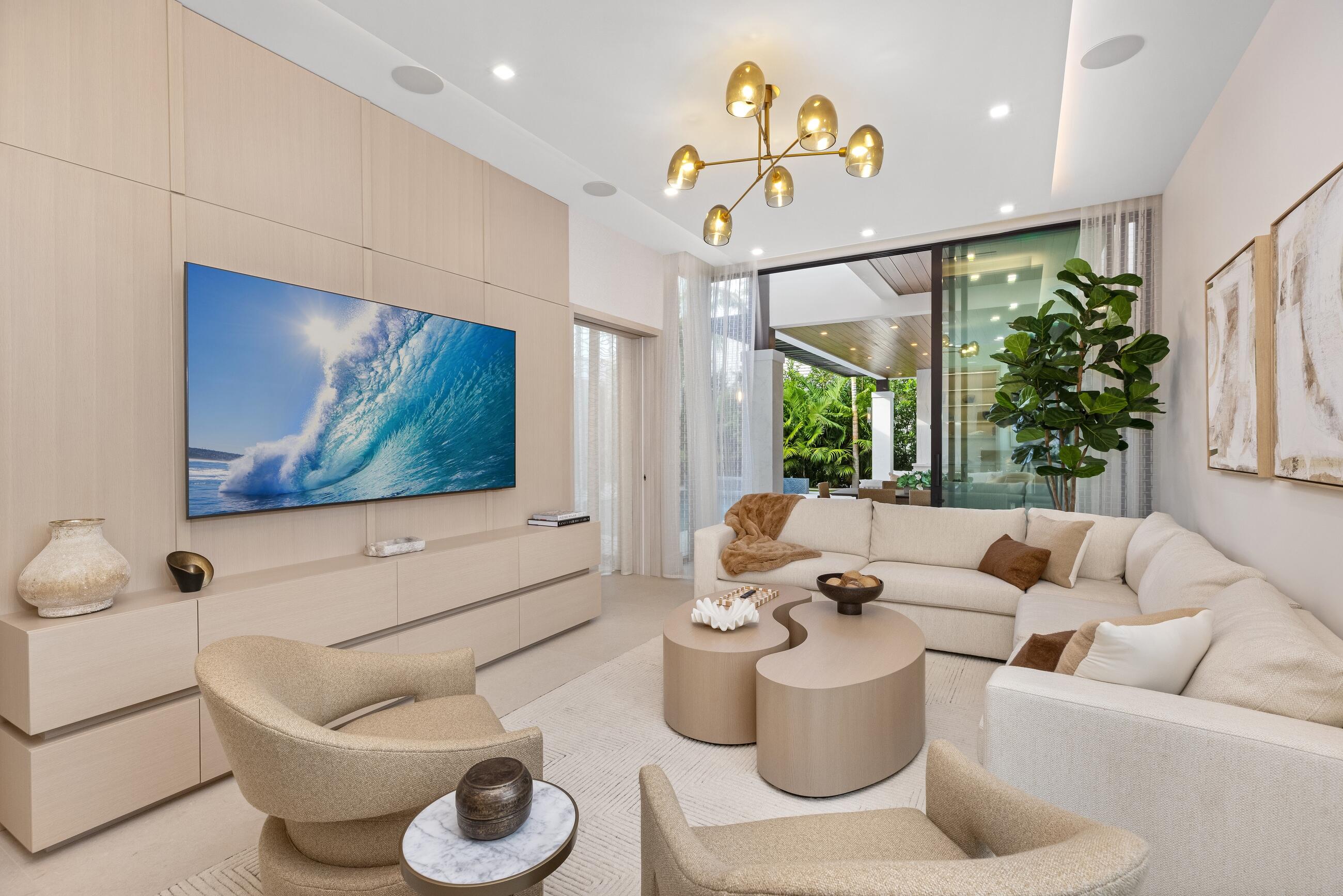 2498 Queen Palm Road Boca Raton, FL 33432 - Photo 42 of 80 a living room with furniture and a large window