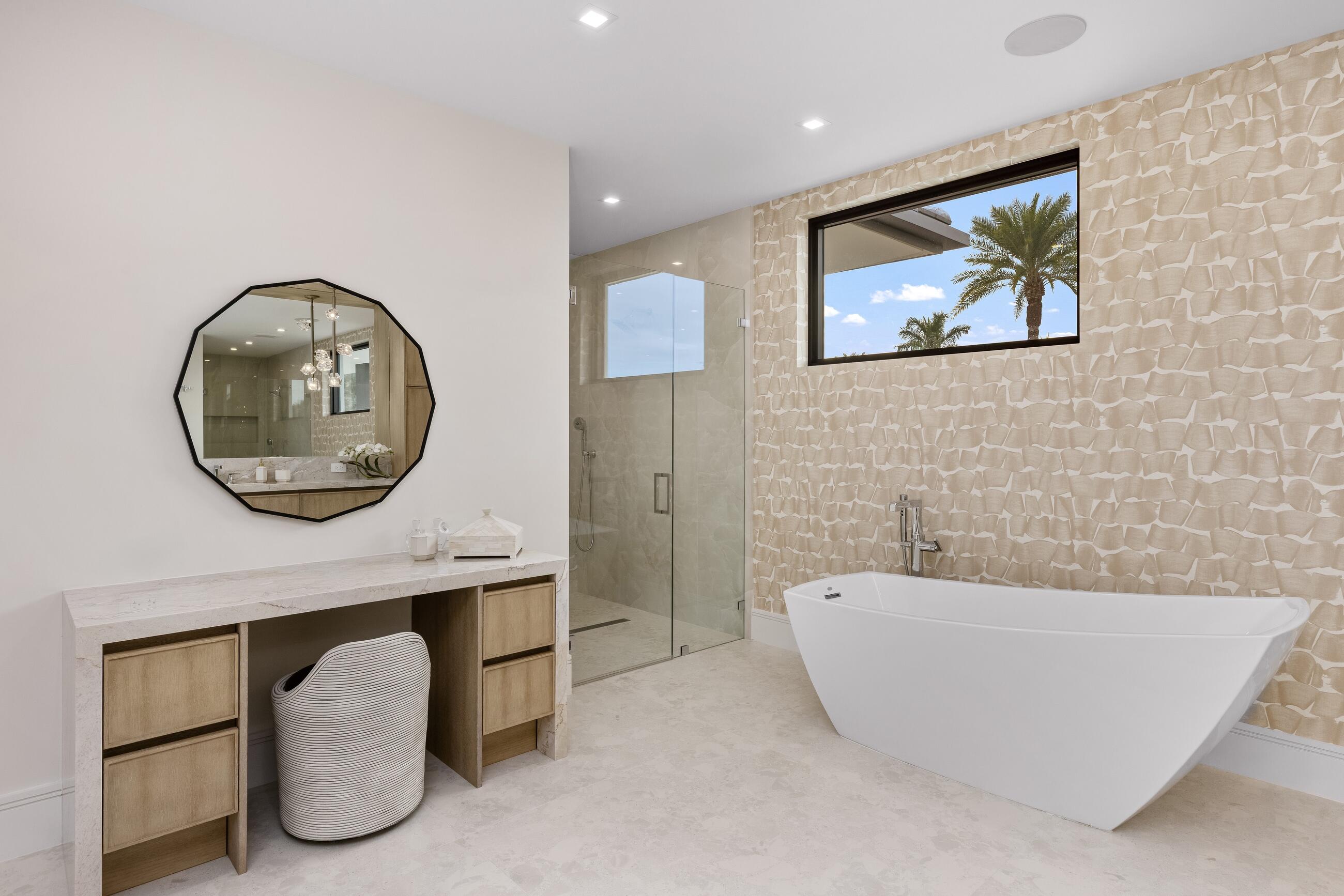 2498 Queen Palm Road Boca Raton, FL 33432 - Photo 58 of 80 a bathroom with a bathtub and a mirror