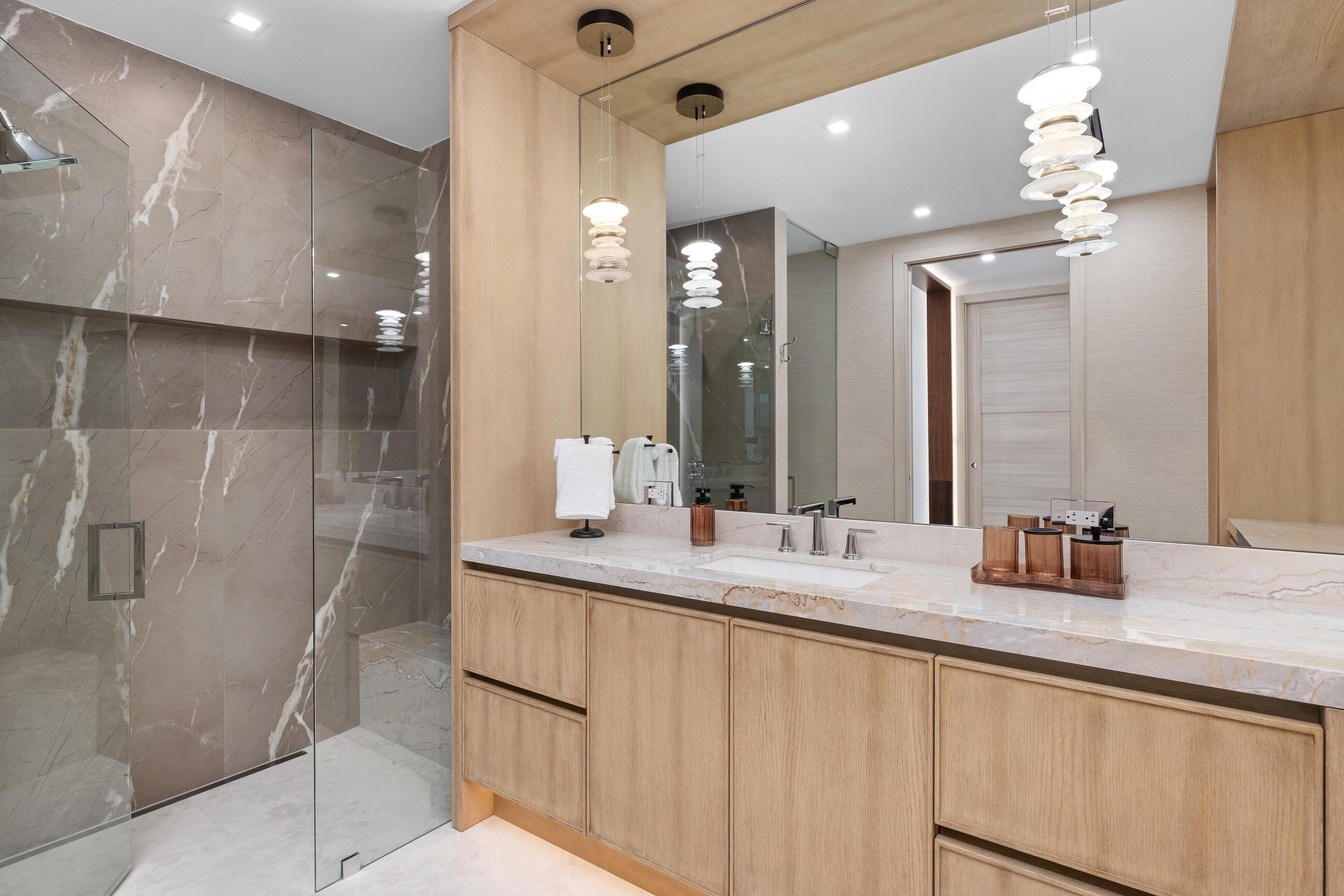 2498 Queen Palm Road Boca Raton, FL 33432 - Photo 61 of 80 a bathroom with double vanity and a shower