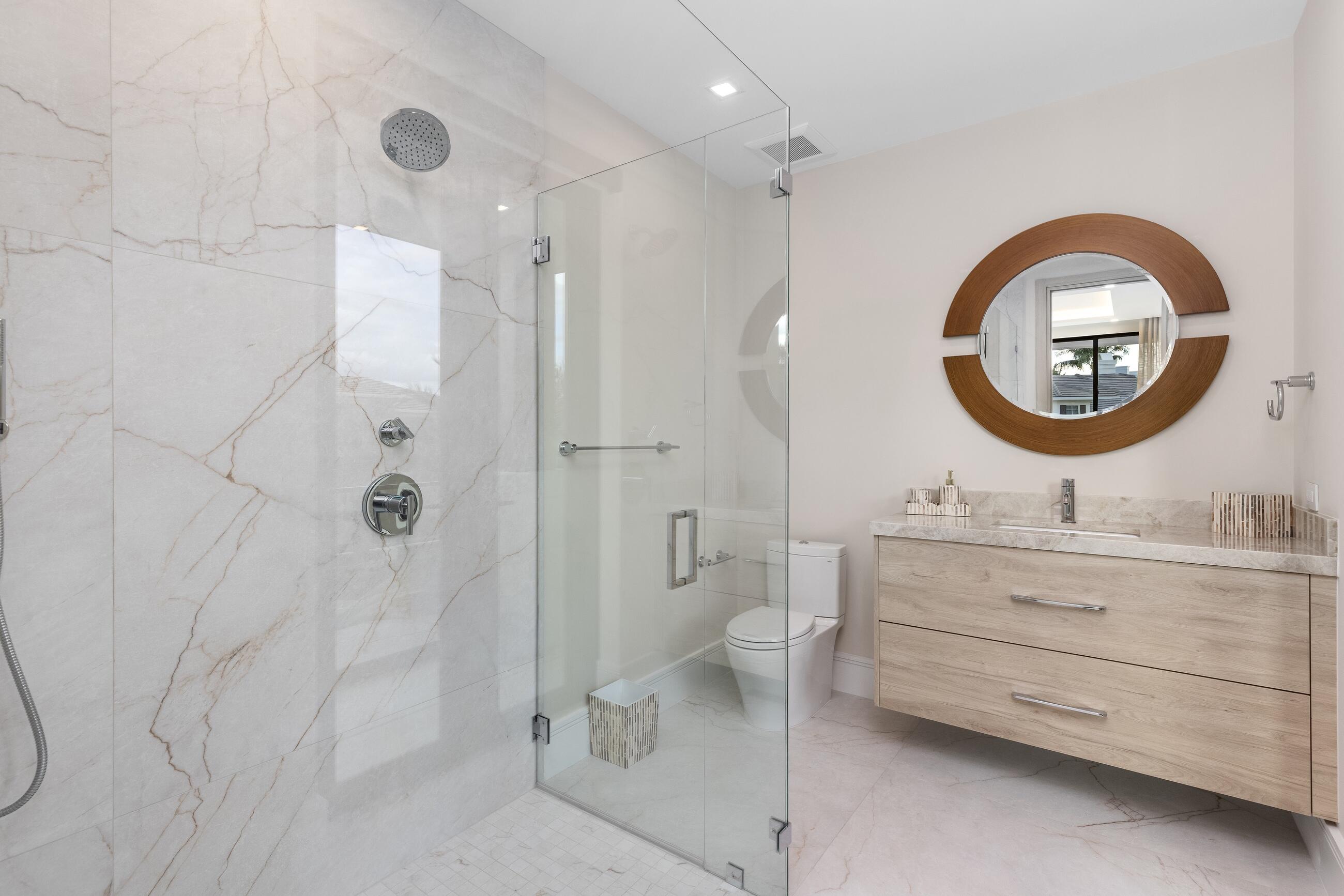 2498 Queen Palm Road Boca Raton, FL 33432 - Photo 67 of 80 a bathroom with a double vanity sink mirror and shower