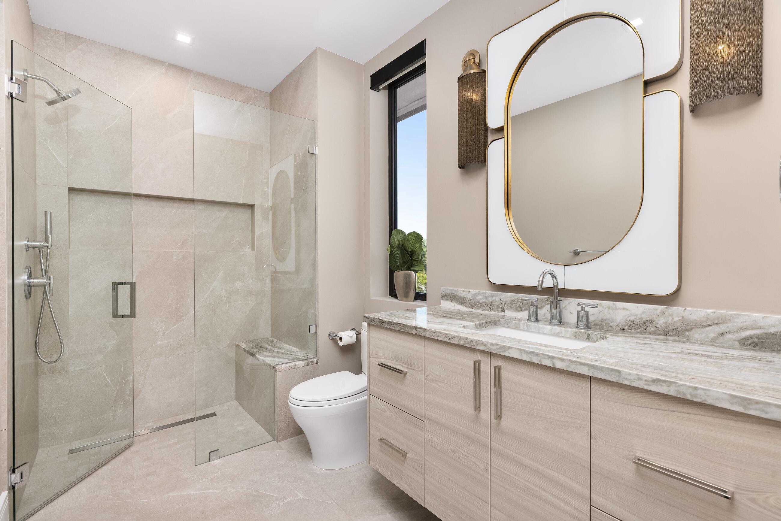 2498 Queen Palm Road Boca Raton, FL 33432 - Photo 74 of 80 a spacious bathroom with a granite countertop sink toilet and shower