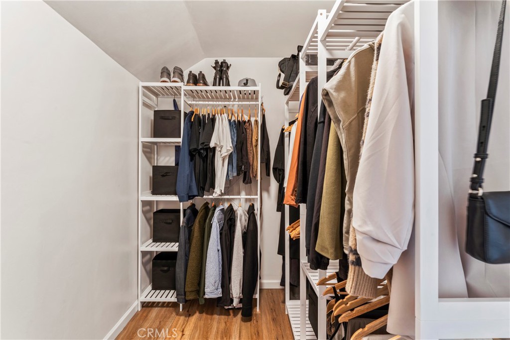 899 Blue Ridge Drive Lake Arrowhead, CA 92385 - Photo 32 of 49 a view of walk in closet with clothes and shoes