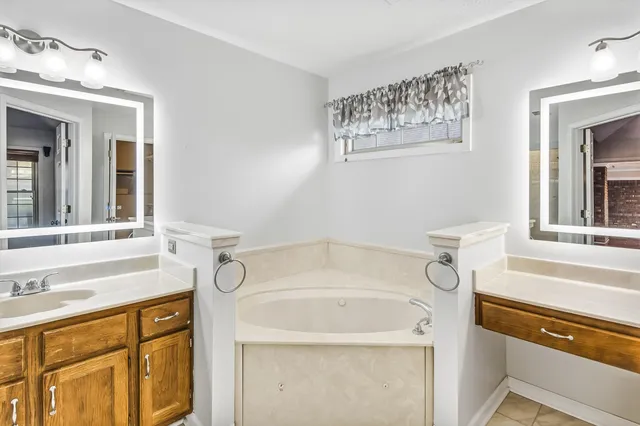 a bathroom with a sink and a bathtub