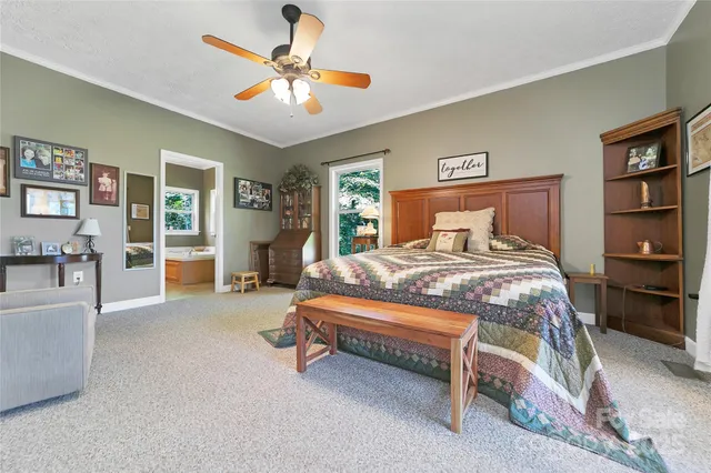 a bathroom with a sink toilet and a mirror