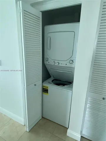 a bathroom with a sink a toilet a mirror and vanity