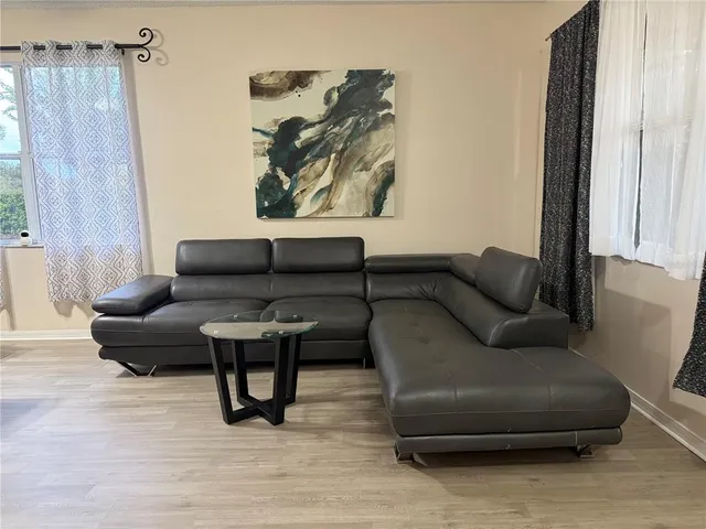 a living room with furniture and a couch