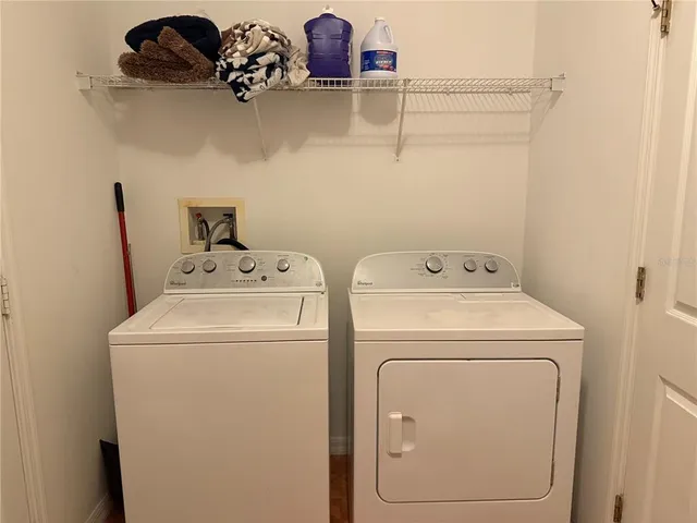 a utility room with dryer and washer