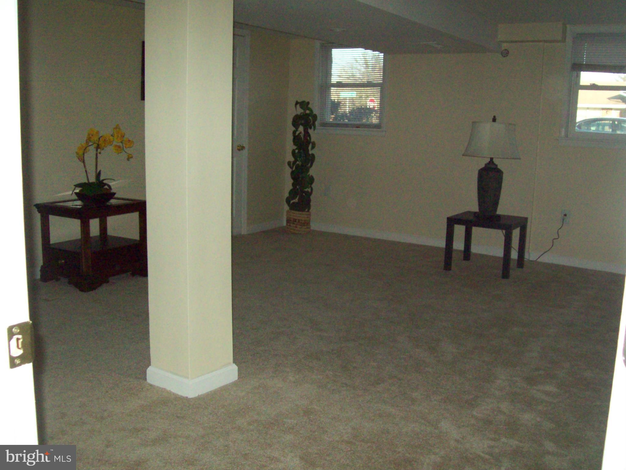 3516 Mayfair Road Baltimore, MD 21207 - Photo 7 of 10 a view of a livingroom with furniture and window