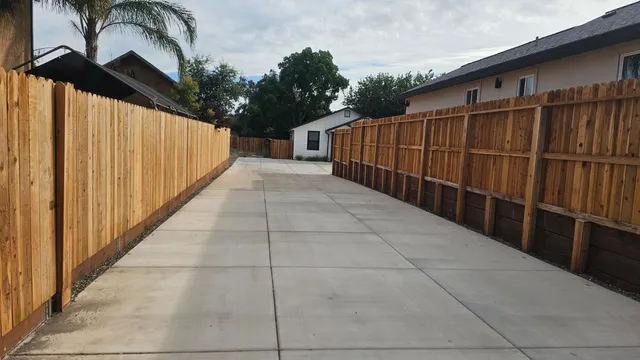 a view of a house with a wooden deck