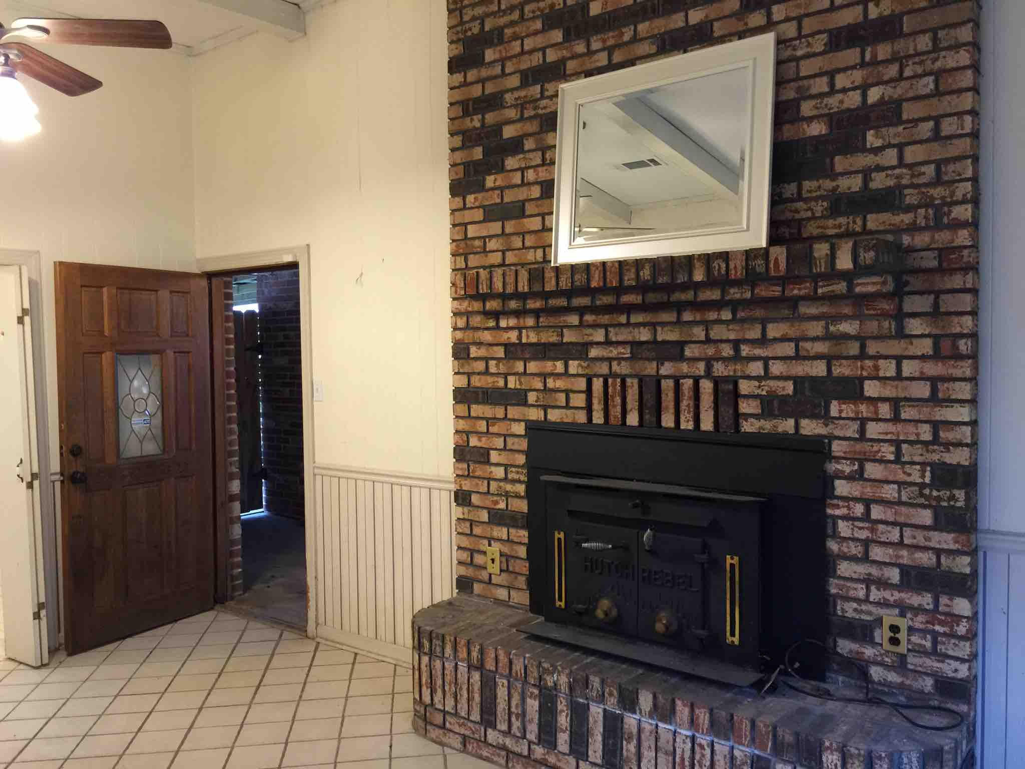 1113 Shady Grove Church Road Baker, FL 32531 - Photo 11 of 23 a view of a livingroom with furniture and a fireplace