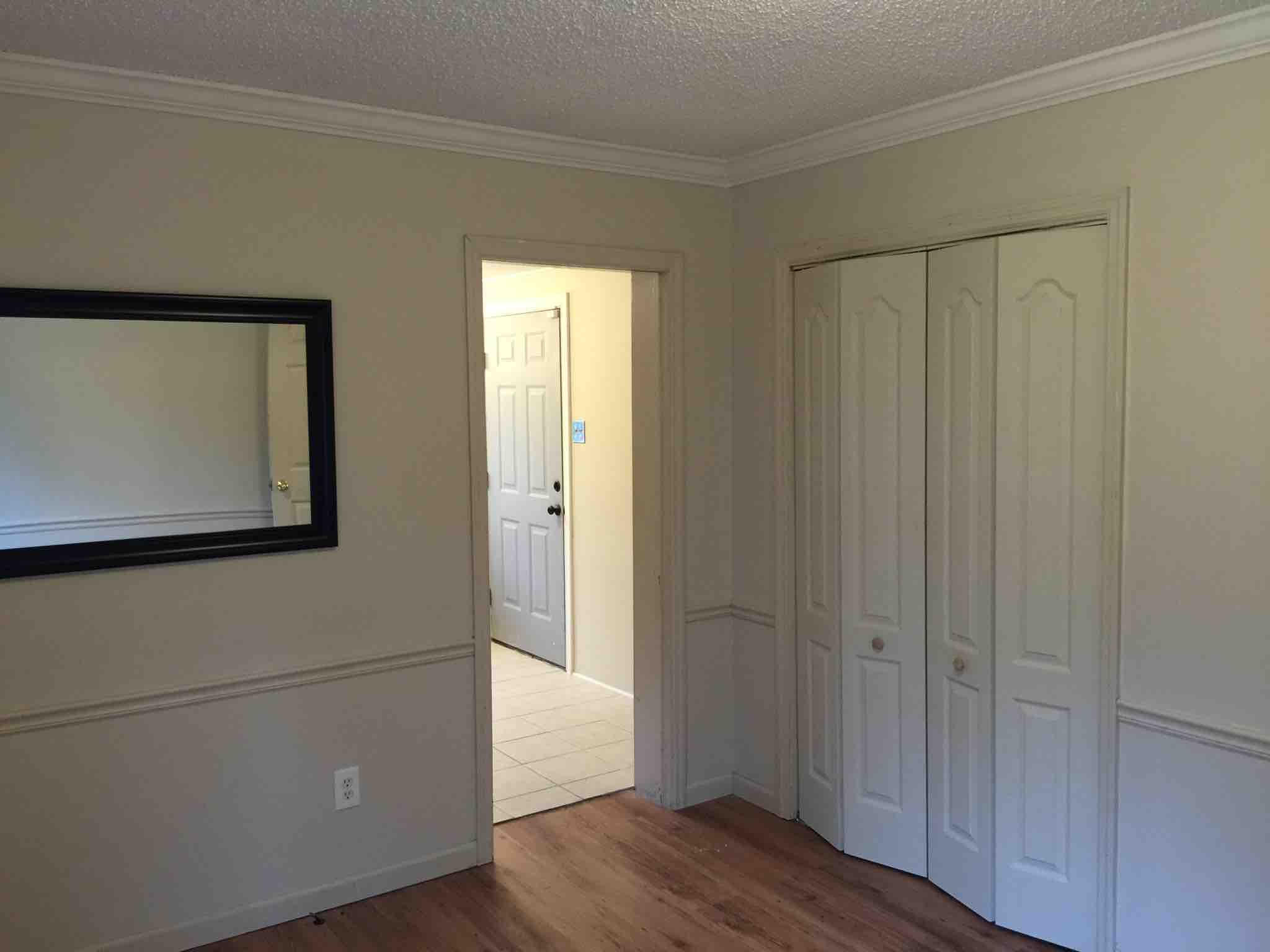 1113 Shady Grove Church Road Baker, FL 32531 - Photo 17 of 23 a view of a hallway with wooden floor