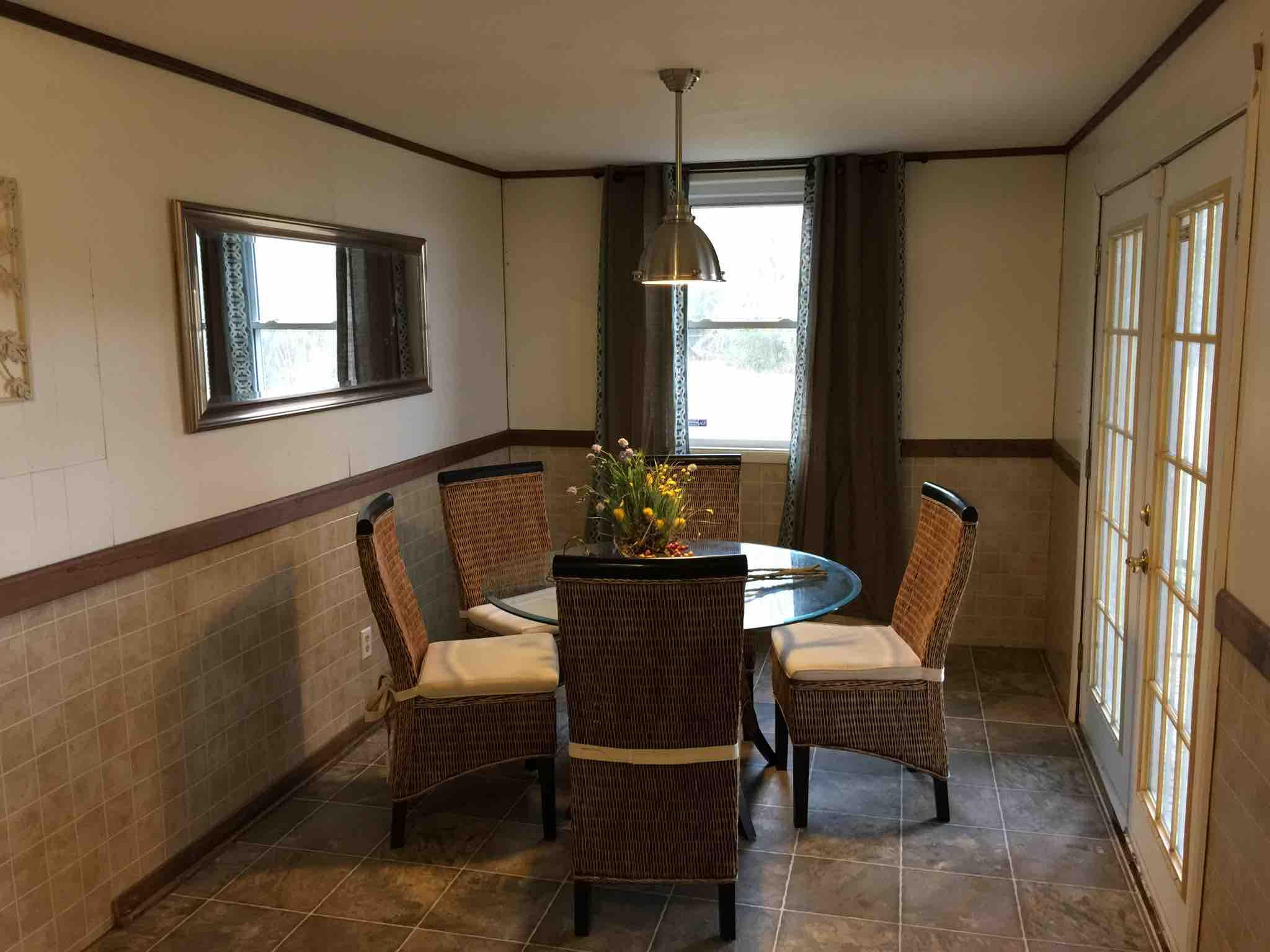 1113 Shady Grove Church Road Baker, FL 32531 - Photo 7 of 23 a dining room with furniture and window