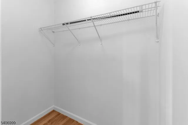 a view of a room with racks on the wall