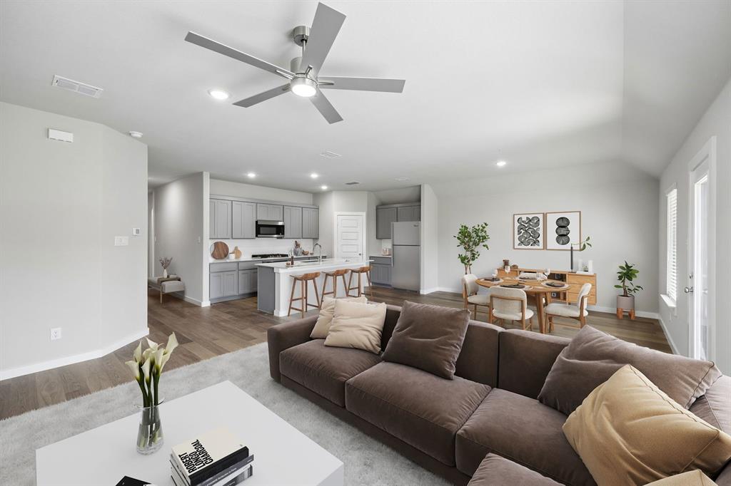 1441 Companero Street Haslet, TX 76052 - Photo 33 of 33 a view of a livingroom with furniture and a ceiling fan