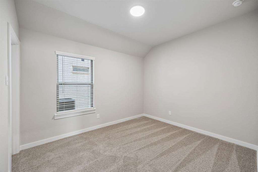 1441 Companero Street Haslet, TX 76052 - Photo 22 of 33 an empty room with a window