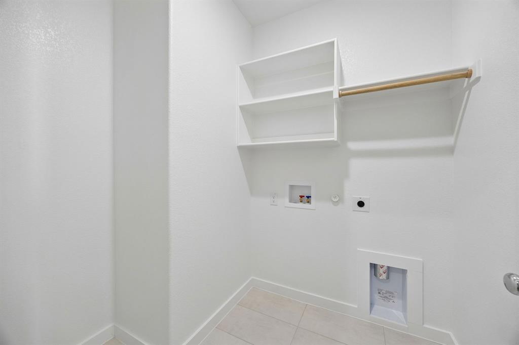 1441 Companero Street Haslet, TX 76052 - Photo 28 of 33 a view of an empty walk in closet