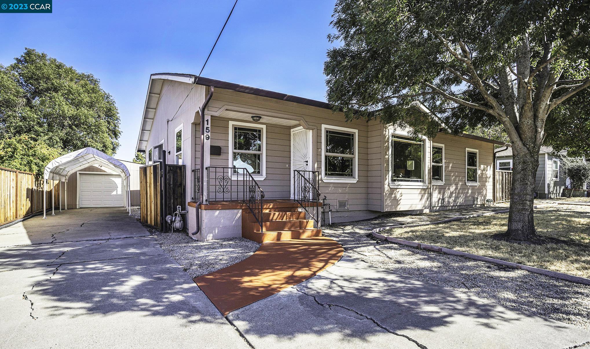 159 Loftus Road Bay Point, CA 94565 - Photo 1 of 1 a front view of a house with a yard