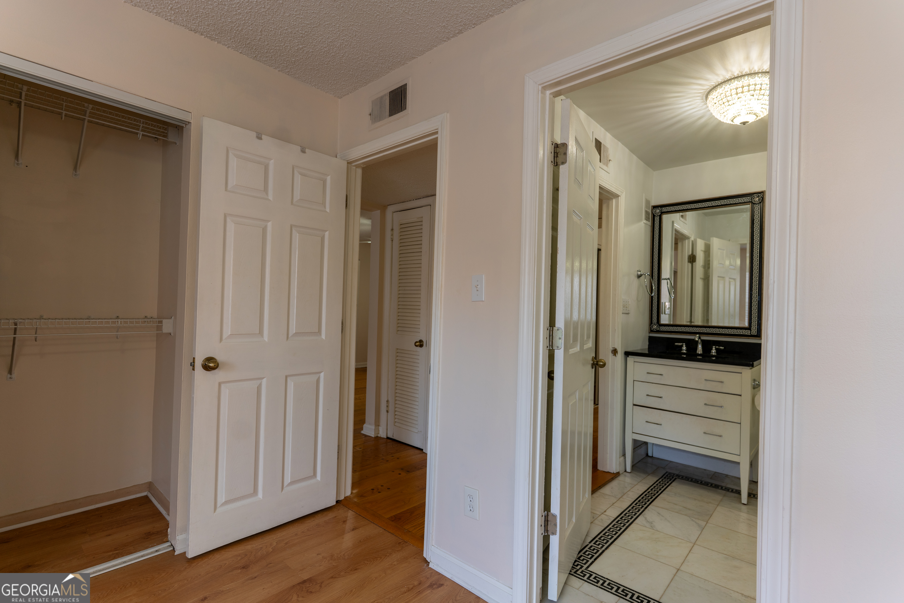 4266 Roswell Road Northeast, Unit K2 Atlanta, GA 30342 - Photo 11 of 18 a view of a bathroom from the hallway
