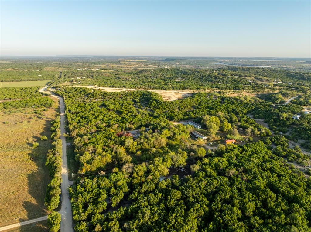 429 County Road 1191 Kopperl, TX 76652 - Photo 22 of 30 View of rural area with a forest