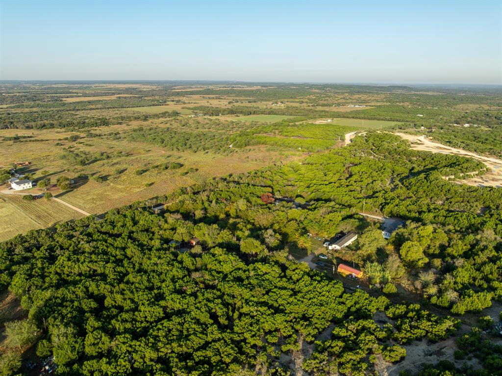 429 County Road 1191 Kopperl, TX 76652 - Photo 24 of 30 Bird's eye view of a heavily wooded area
