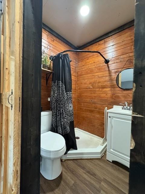 429 County Road 1191 Kopperl, TX 76652 - Photo 9 of 30 Full bath with a stall shower, vanity, wood finished floors, and wooden walls