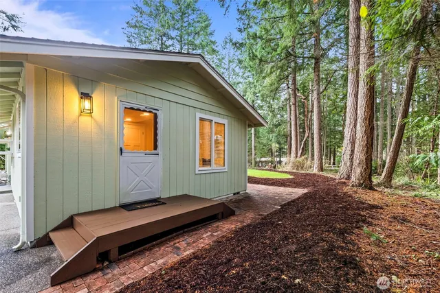 a house with trees in the background