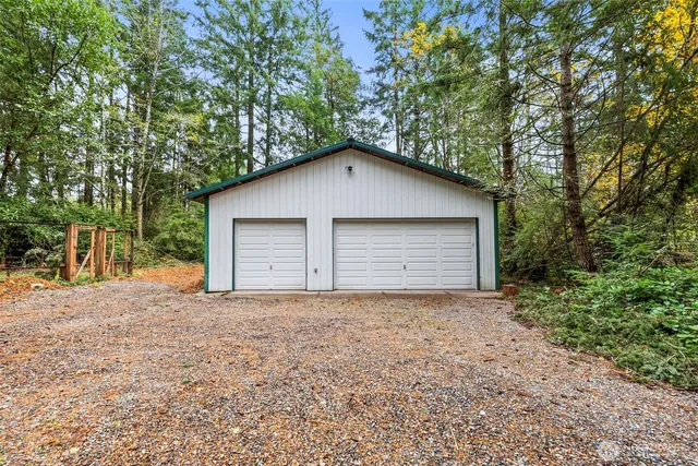 a house with trees in the background