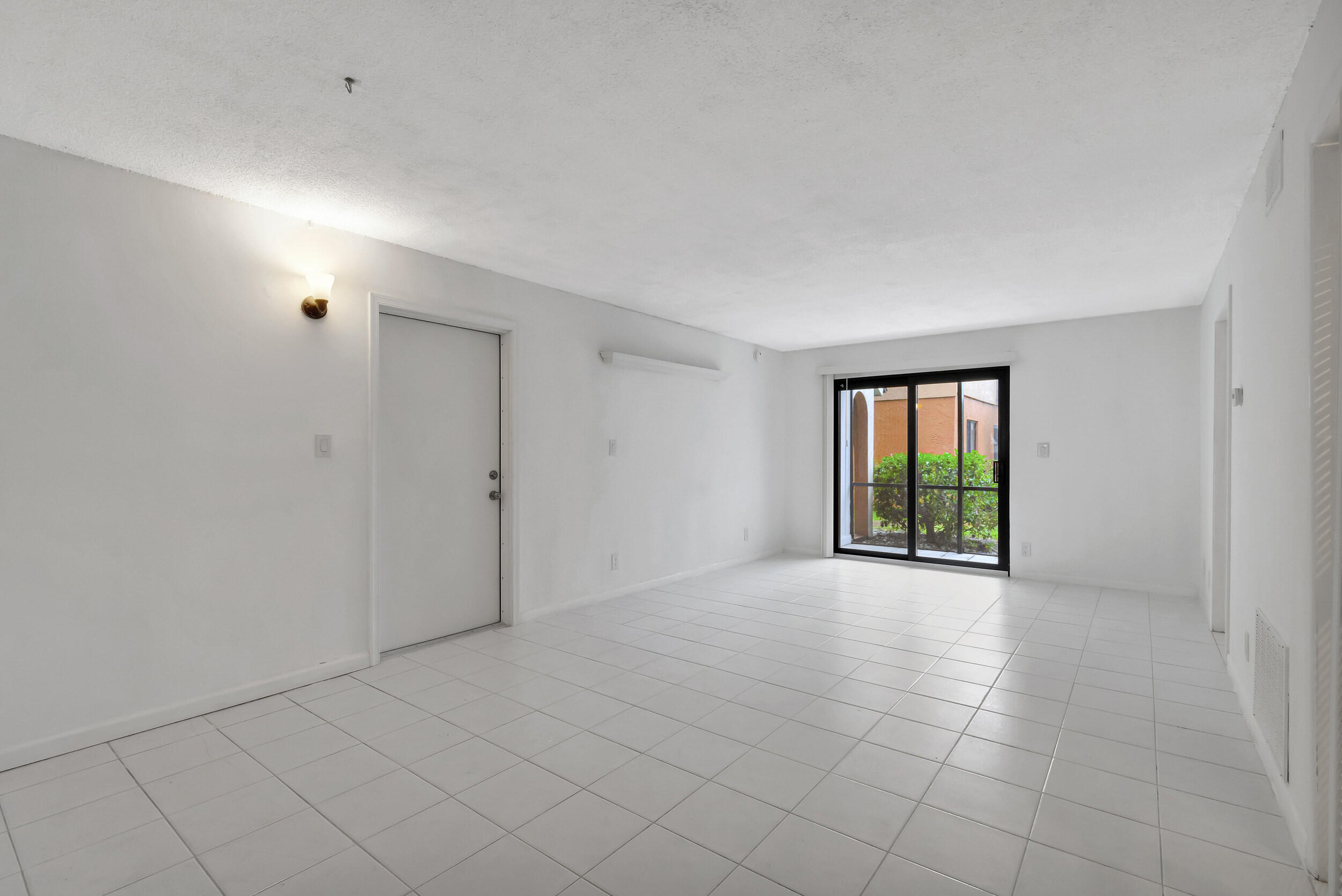 50 Southeast 12th Street, Unit 165 Boca Raton, FL 33432 - Photo 8 of 36 Dining Room/Living Room Area