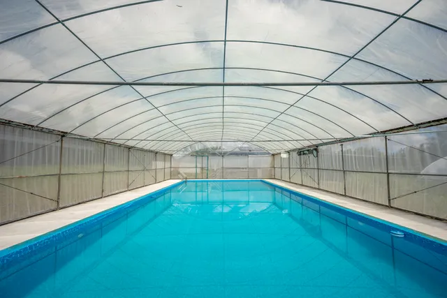 a view of a room with a ceiling fan