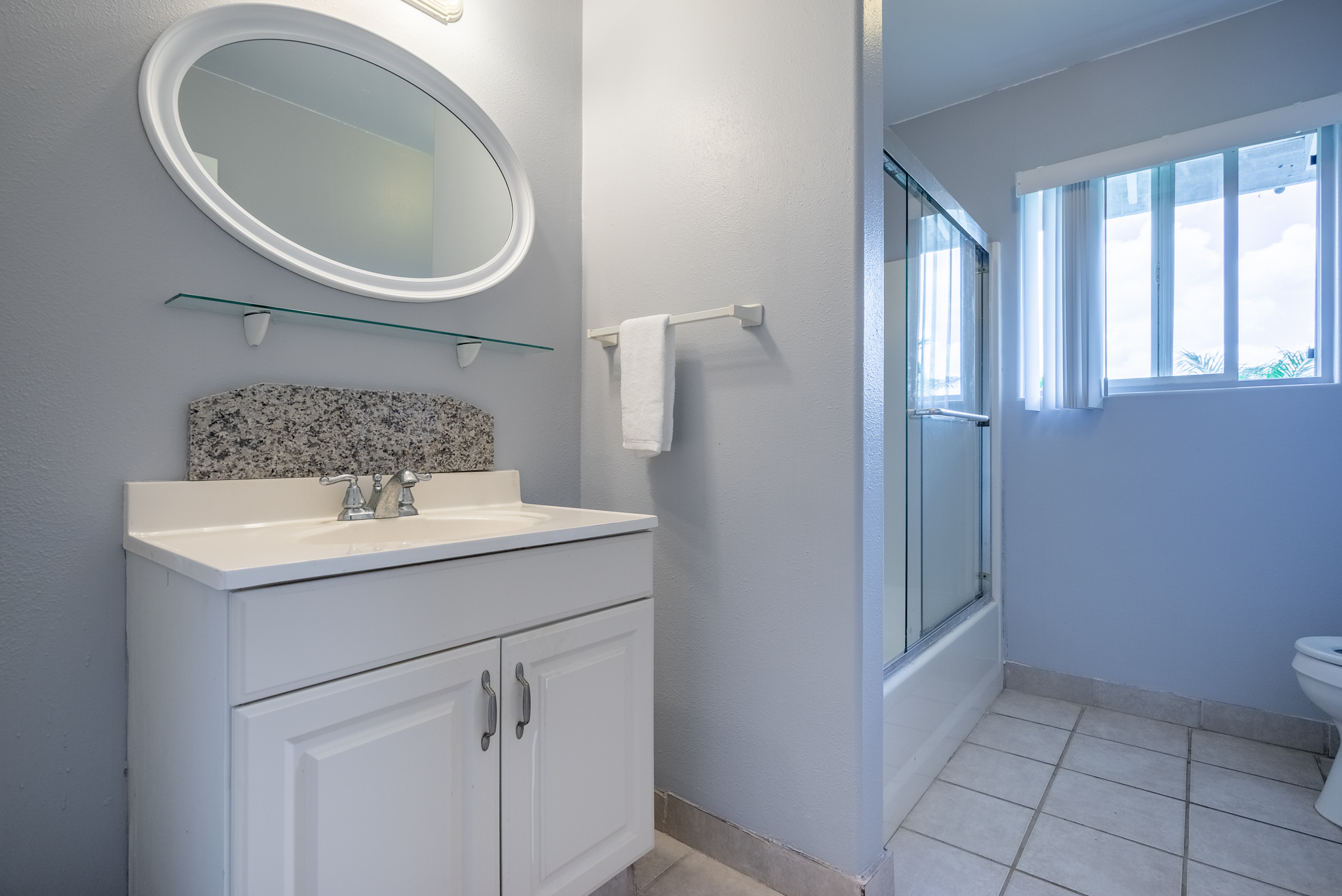 18-3840 South Lauko Road Mountain View, HI 96771 - Photo 9 of 30 a bathroom with a sink a toilet and a mirror