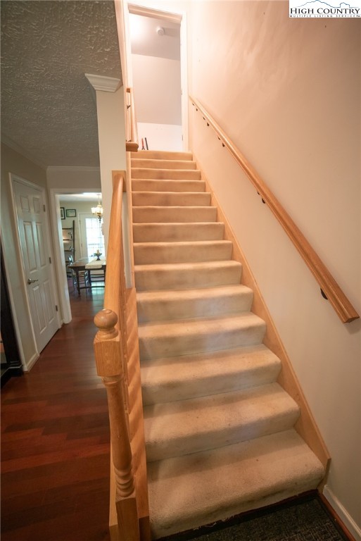 182 Henley Lane Newland, NC 28657 - Photo 22 of 28 a view of entryway and hall with wooden floor