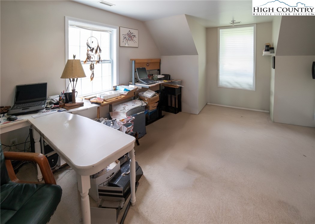182 Henley Lane Newland, NC 28657 - Photo 23 of 28 a view of a workspace with furniture and a window
