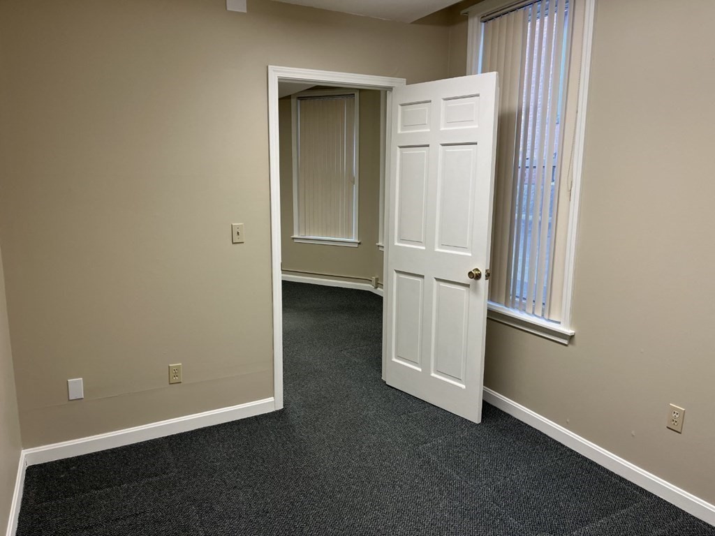 5 State Street, Unit R1 Worcester, MA 01609 - Photo 21 of 26 an empty room with closet