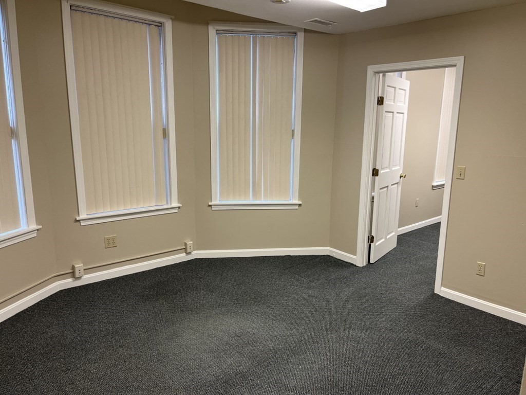 5 State Street, Unit R1 Worcester, MA 01609 - Photo 23 of 26 an empty room with windows