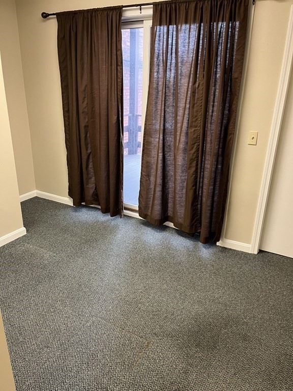 5 State Street, Unit R1 Worcester, MA 01609 - Photo 8 of 26 a view of a closet with a mirror