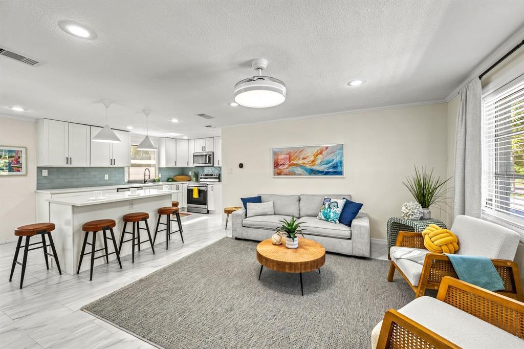 578 Companion Way Longboat Key, FL 34228 - Photo 17 of 70 a large kitchen with a table and chairs