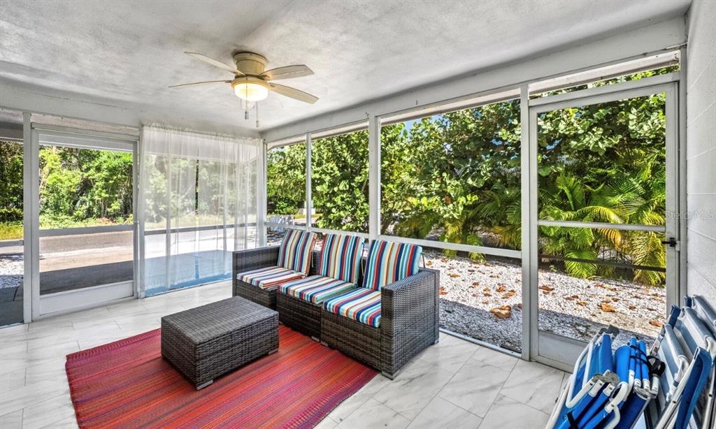 578 Companion Way Longboat Key, FL 34228 - Photo 36 of 70 a living room with furniture and a large window
