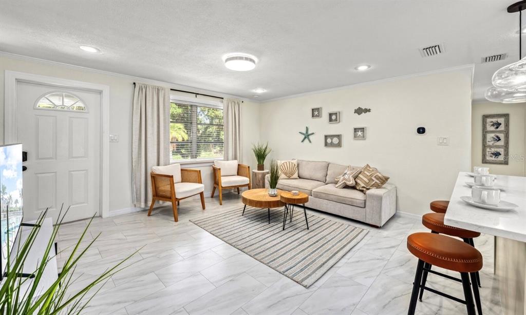 578 Companion Way Longboat Key, FL 34228 - Photo 45 of 70 a living room with furniture and a large window