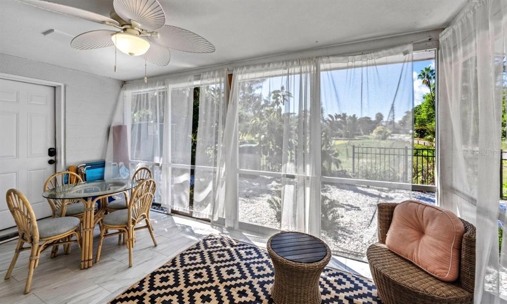 578 Companion Way Longboat Key, FL 34228 - Photo 63 of 70 a living room with furniture and a window