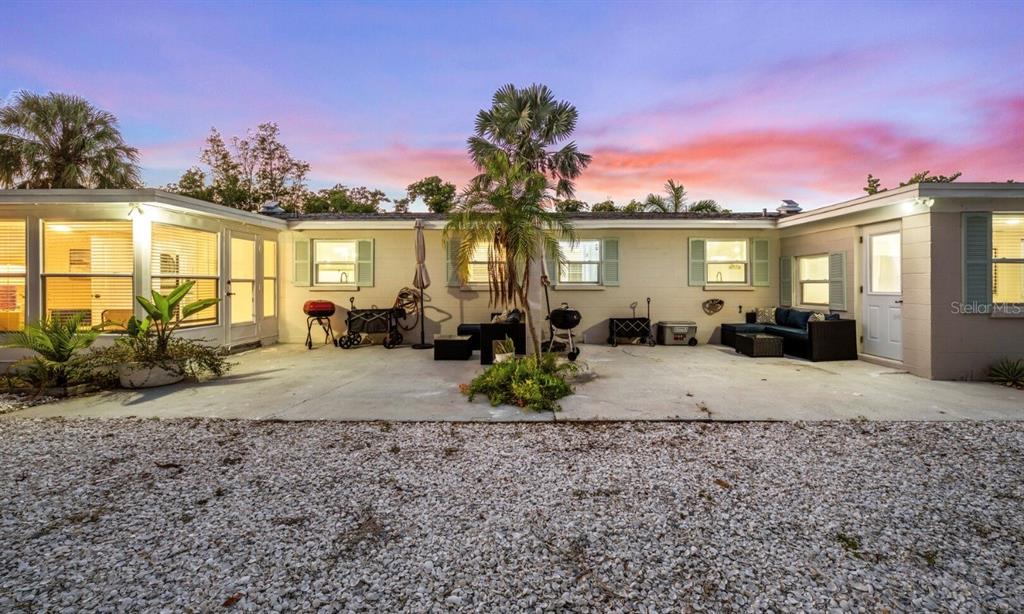 578 Companion Way Longboat Key, FL 34228 - Photo 65 of 70 a front view of a house with a porch