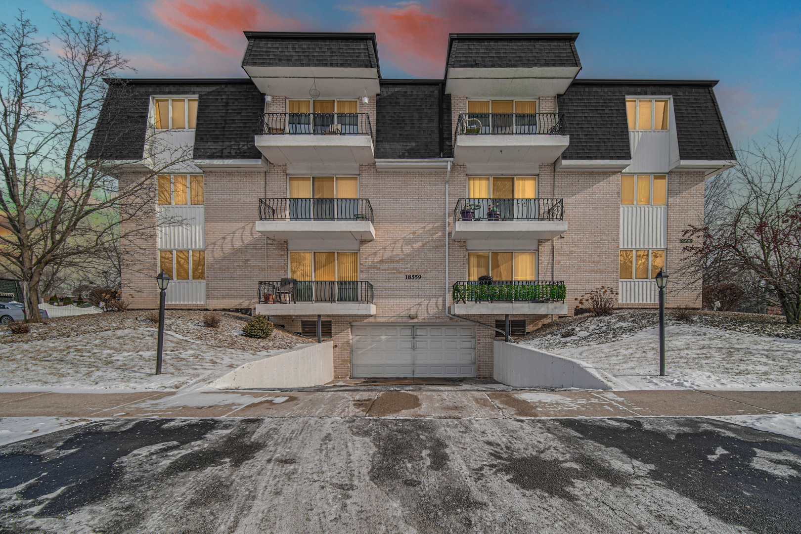 18559 Escanaba Avenue, Unit 201 Lansing, IL 60438 - Photo 1 of 17 front view of a building