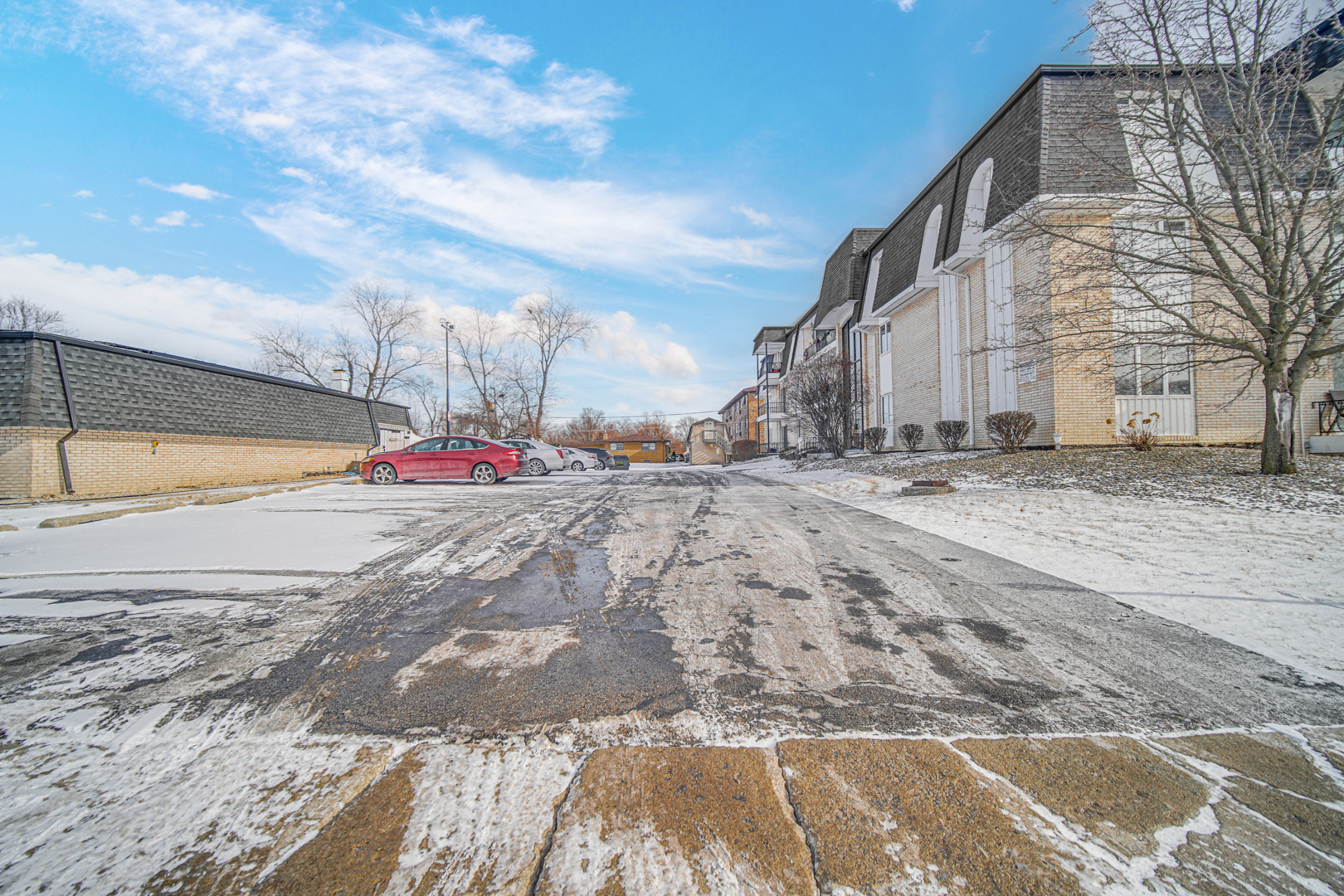 18559 Escanaba Avenue, Unit 201 Lansing, IL 60438 - Photo 17 of 17 a view of road and building