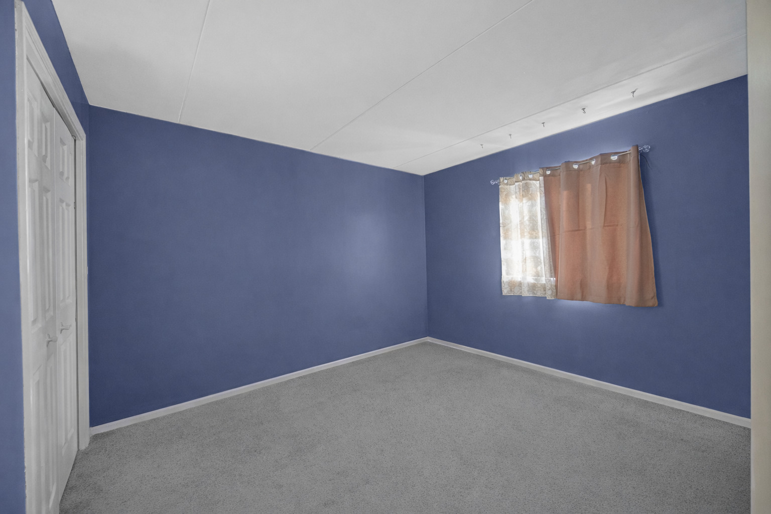 18559 Escanaba Avenue, Unit 201 Lansing, IL 60438 - Photo 10 of 17 an empty room with windows