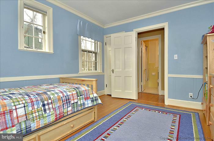 9423 Thornhill Road Silver Spring, MD 20901 - Photo 1 of 30 a bedroom with a bed and a window