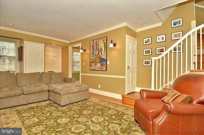 9423 Thornhill Road Silver Spring, MD 20901 - Photo 16 of 30 a living room with furniture and large windows