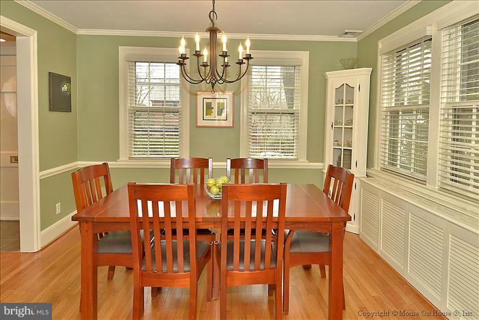 9423 Thornhill Road Silver Spring, MD 20901 - Photo 28 of 30 a view of a dining room with furniture and windows