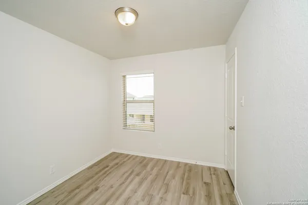 an empty room with a window