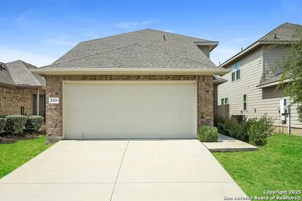 a house view with a outdoor space