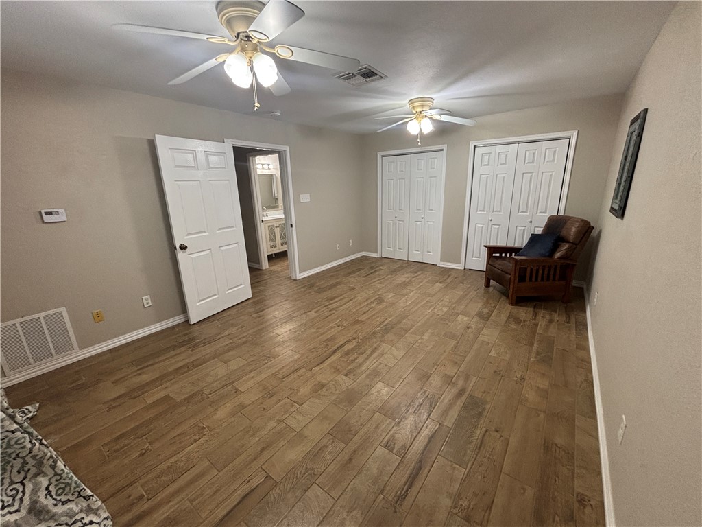 4957 Shadowbend Drive Corpus Christi, TX 78413 - Photo 31 of 35 a view of livingroom with furniture and chandelier fan